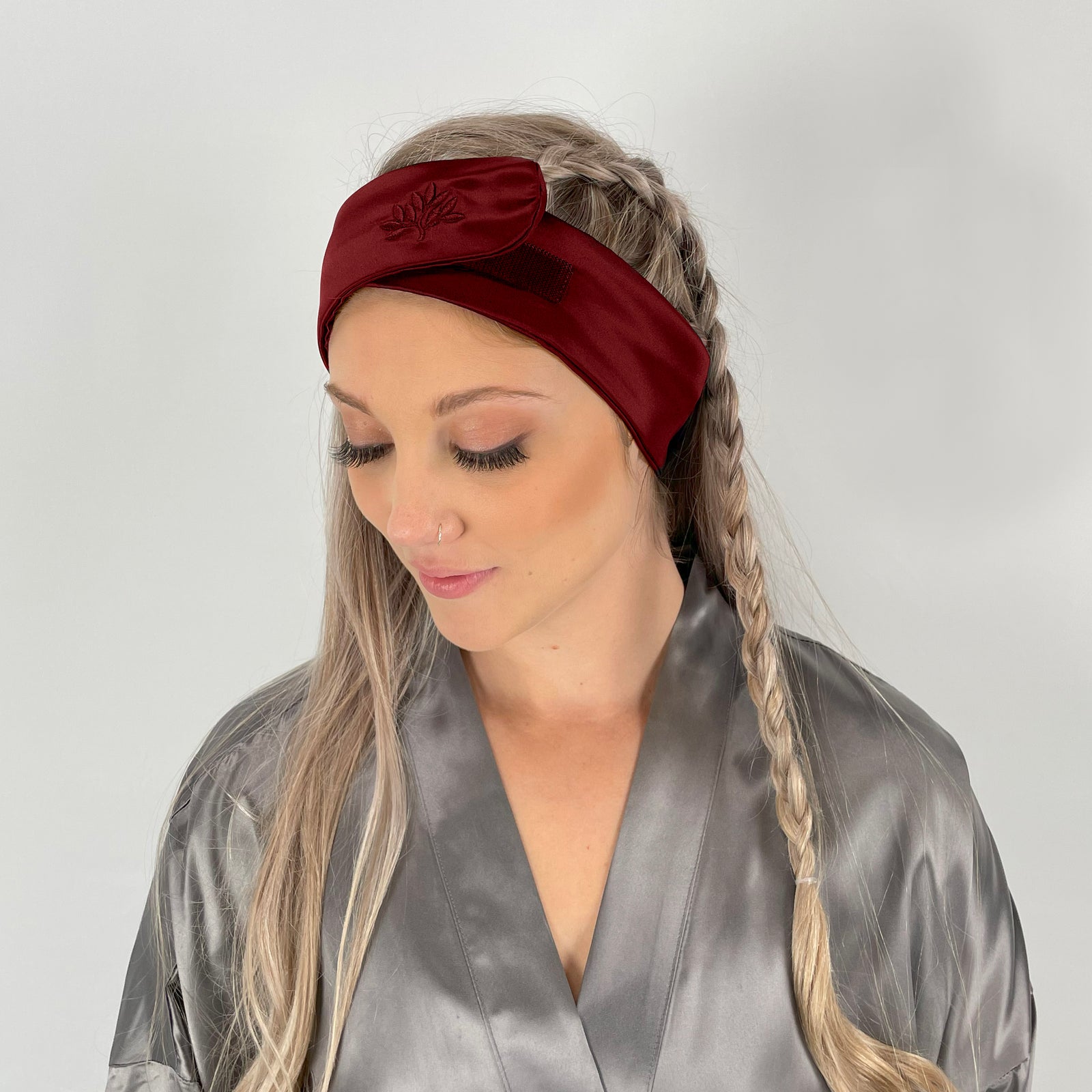 Silk Glam Band - Cabernet by Mulberry Park Silks: A deep-red, embroidered silk headband in a branded box on marble, showcasing luxury haircare elegance.