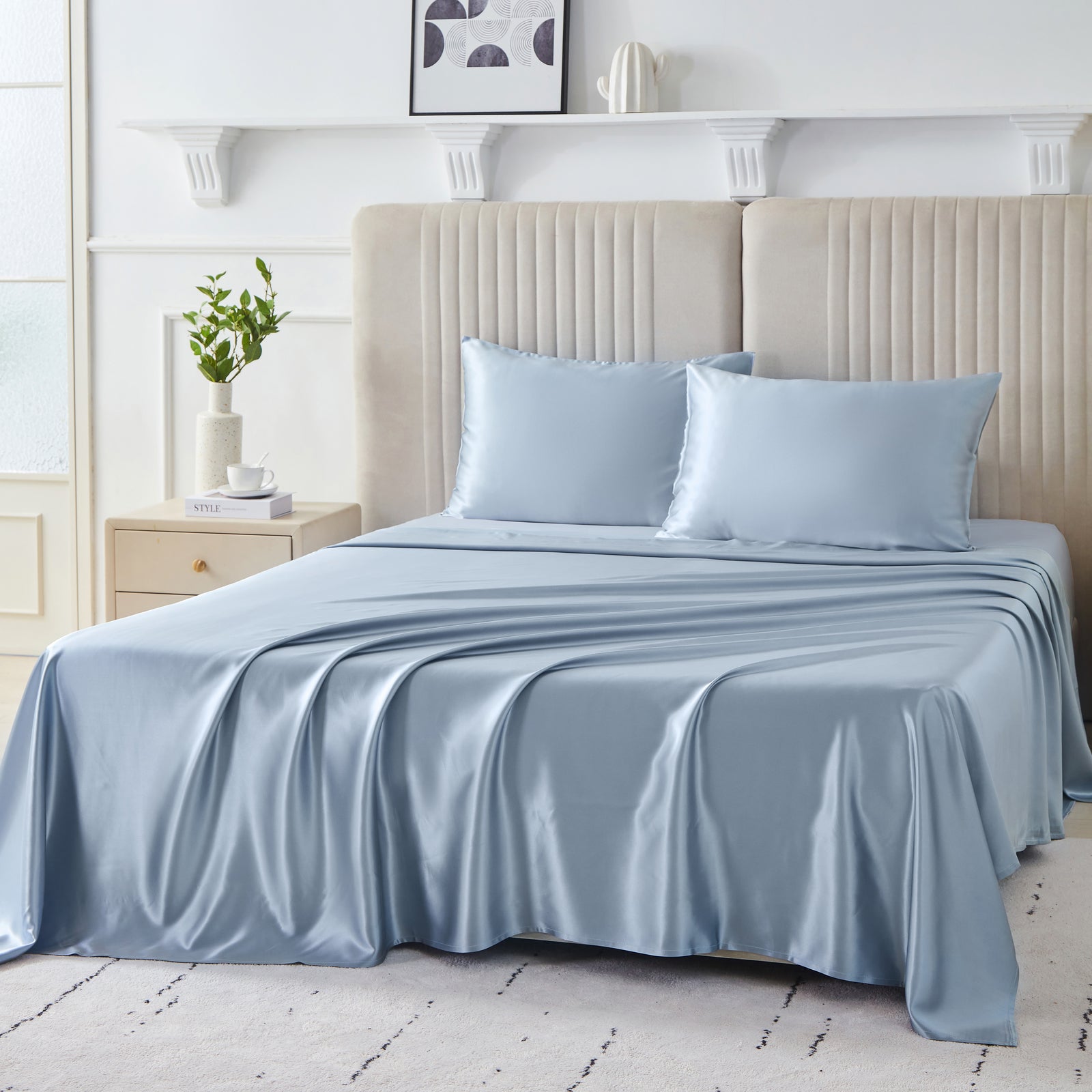 Elegant 22 Momme Silk Sheets Set in Steel Blue color displayed on a beautiful bed with silk pillows