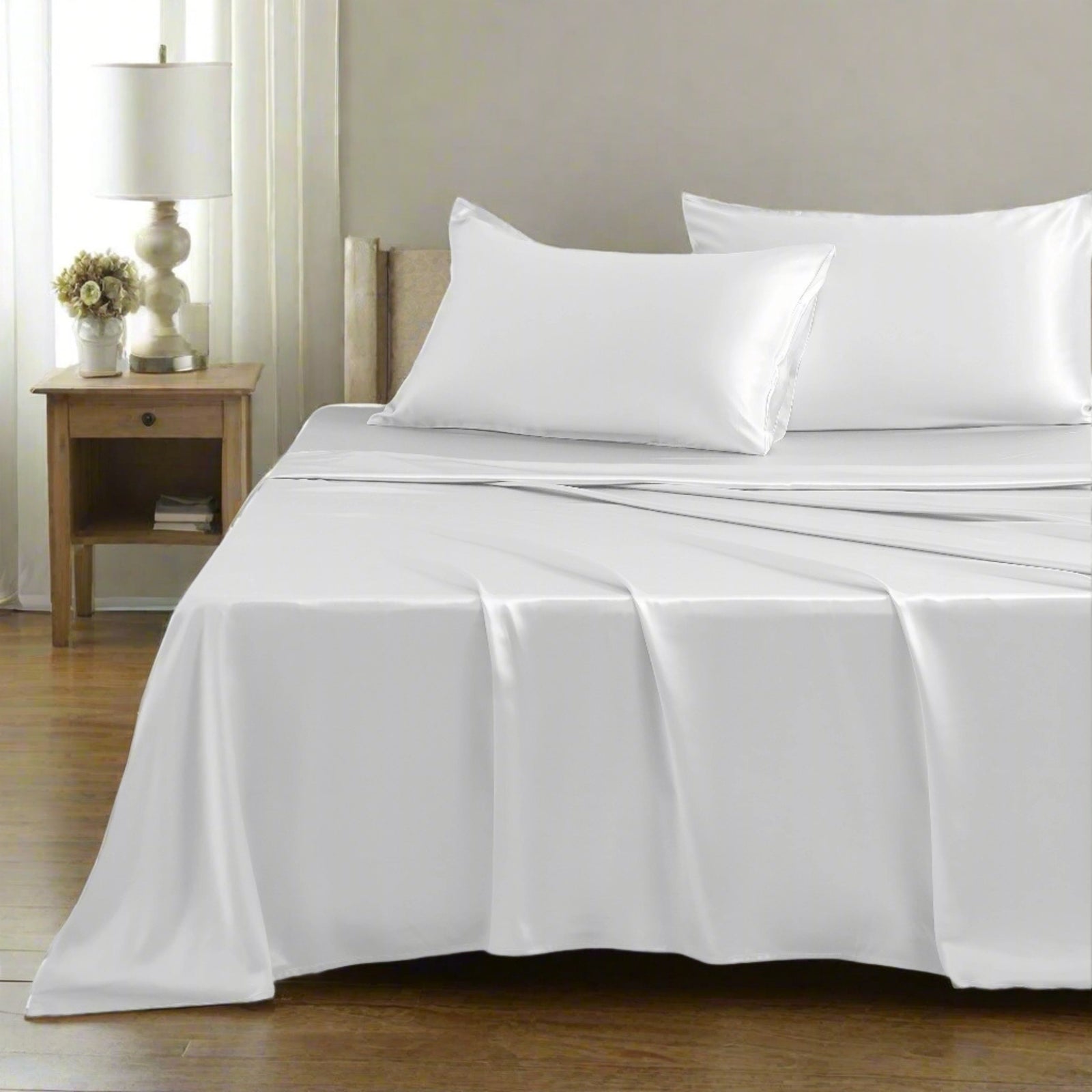 Luxurious 19 momme mulberry silk sheets with pillowcases, offering a soft, smooth, and glossy finish