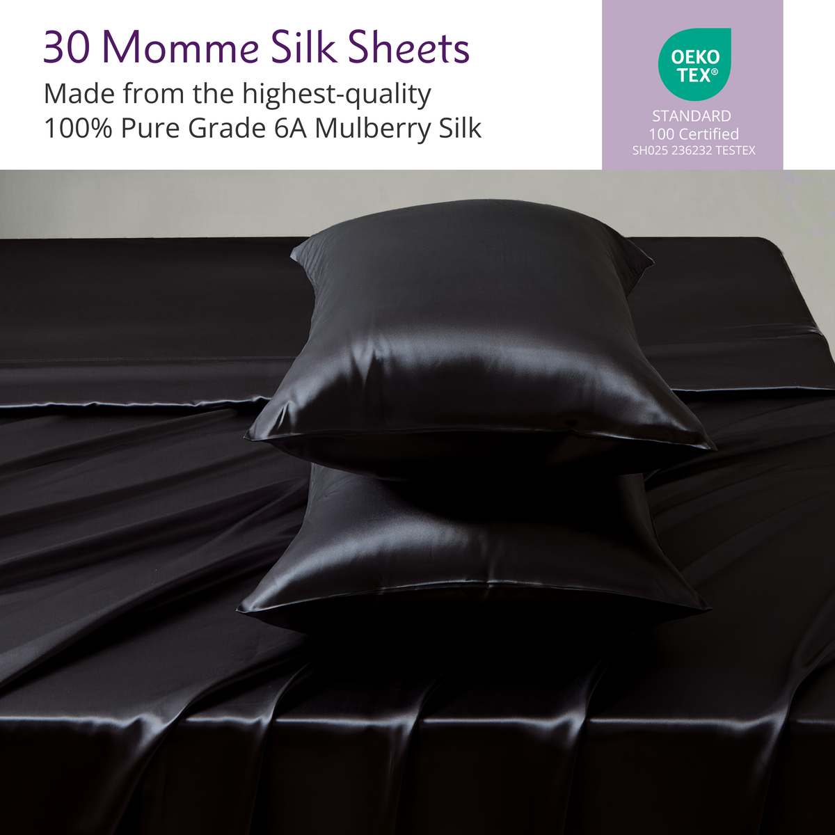 Two black luxury silk bedding pillowcases and a mulberry silk sheet set are displayed on a bed with visible folds.