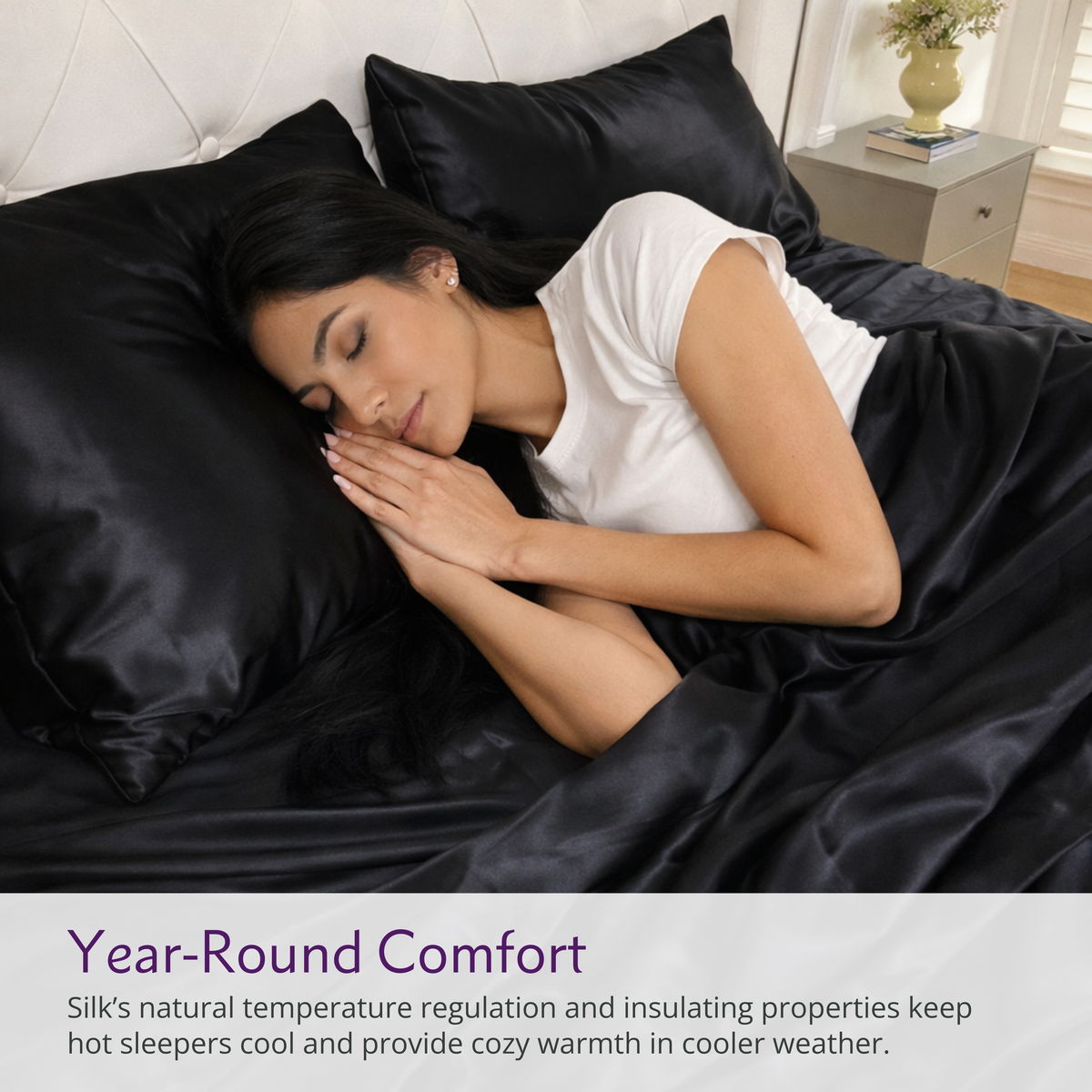 Woman sleeping under black Silk sheets and pillows with a text overlay about year-round comfort.