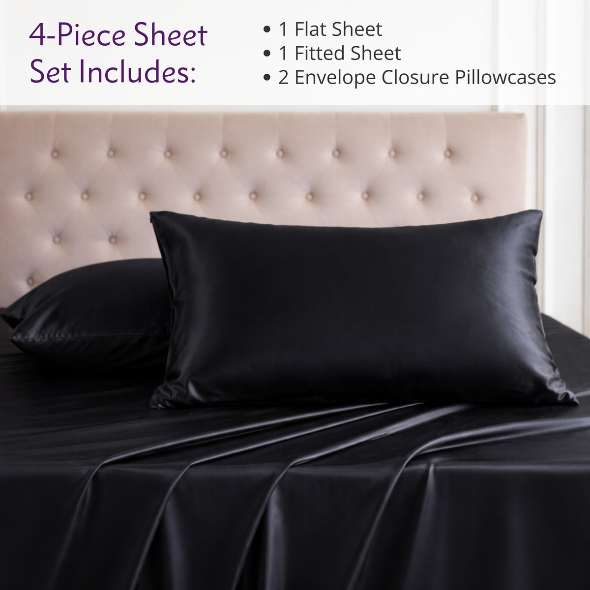 Black satin bedding and two pillows on a bed; luxury silk sheet set listed with tufted headboard in background.