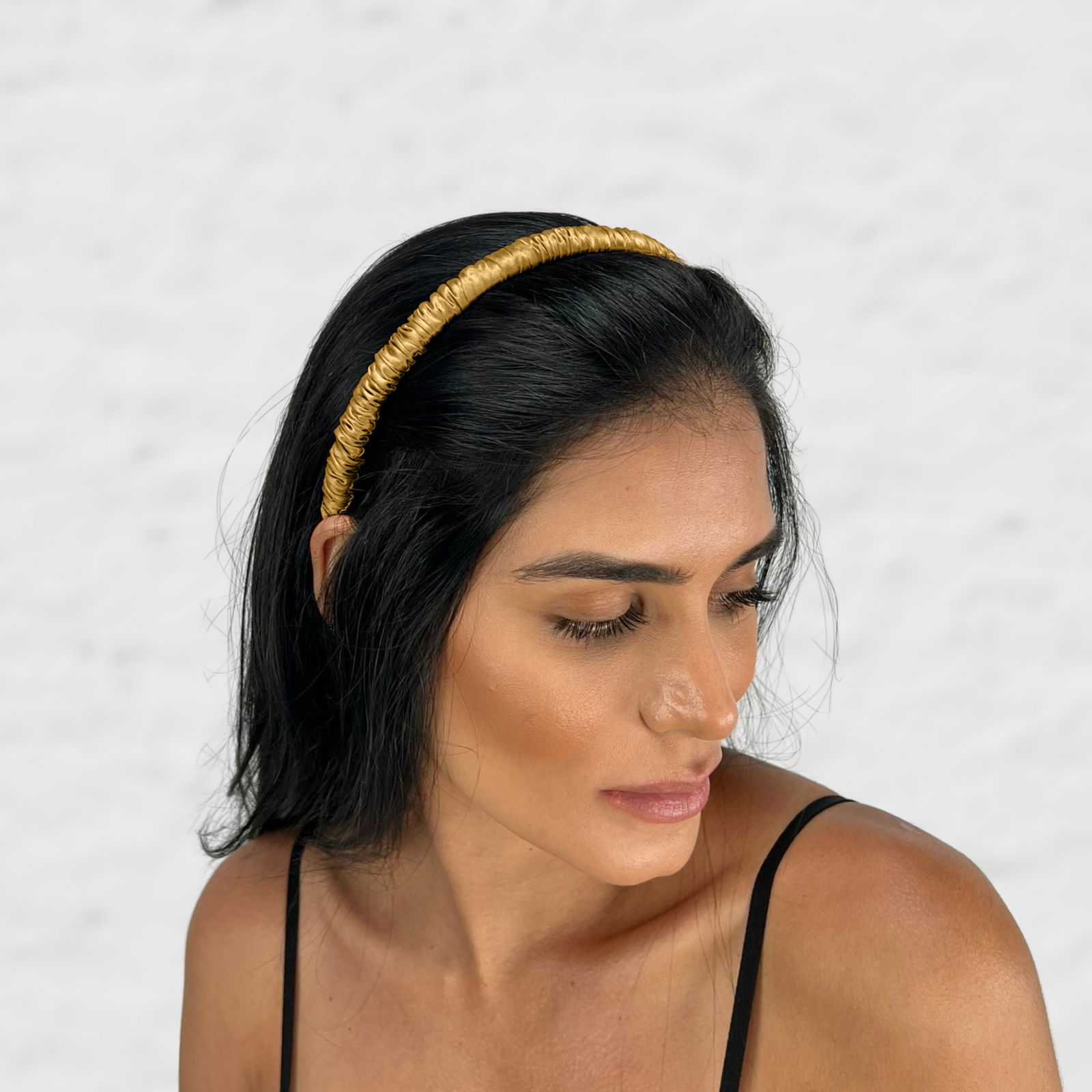 Luxurious 19 Momme silk headbands for women in Gold with a skinny scrunched design 
