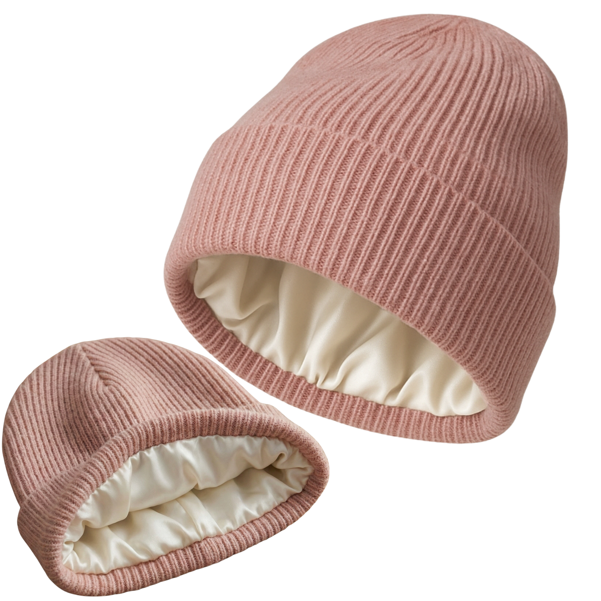 Pink knit hats with ivory silk lining on a white background
