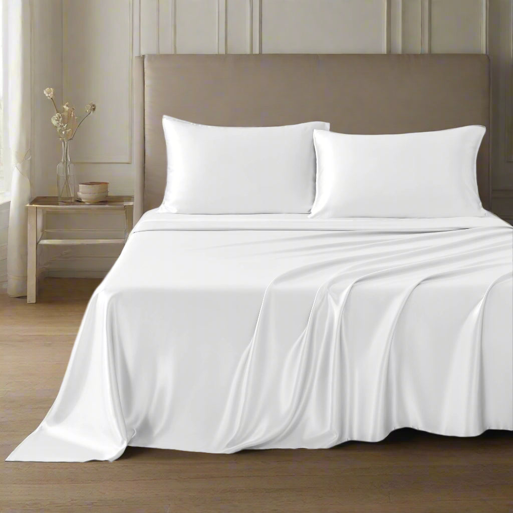 Elegant 30 Momme Silk Sheets Set in White color displayed on a beautiful bed with silk pillows