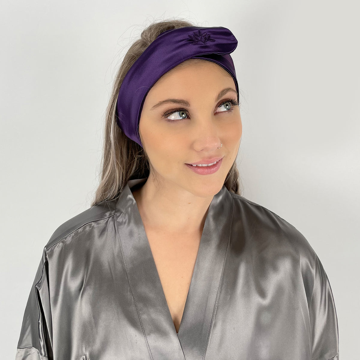 Woman wearing a Plum Silk Glam Band from Mulberry Park Silks